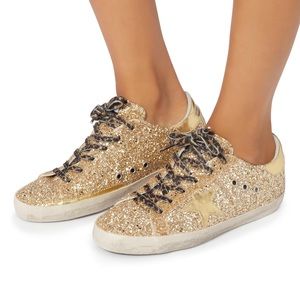 Golden Goose gold sneakers